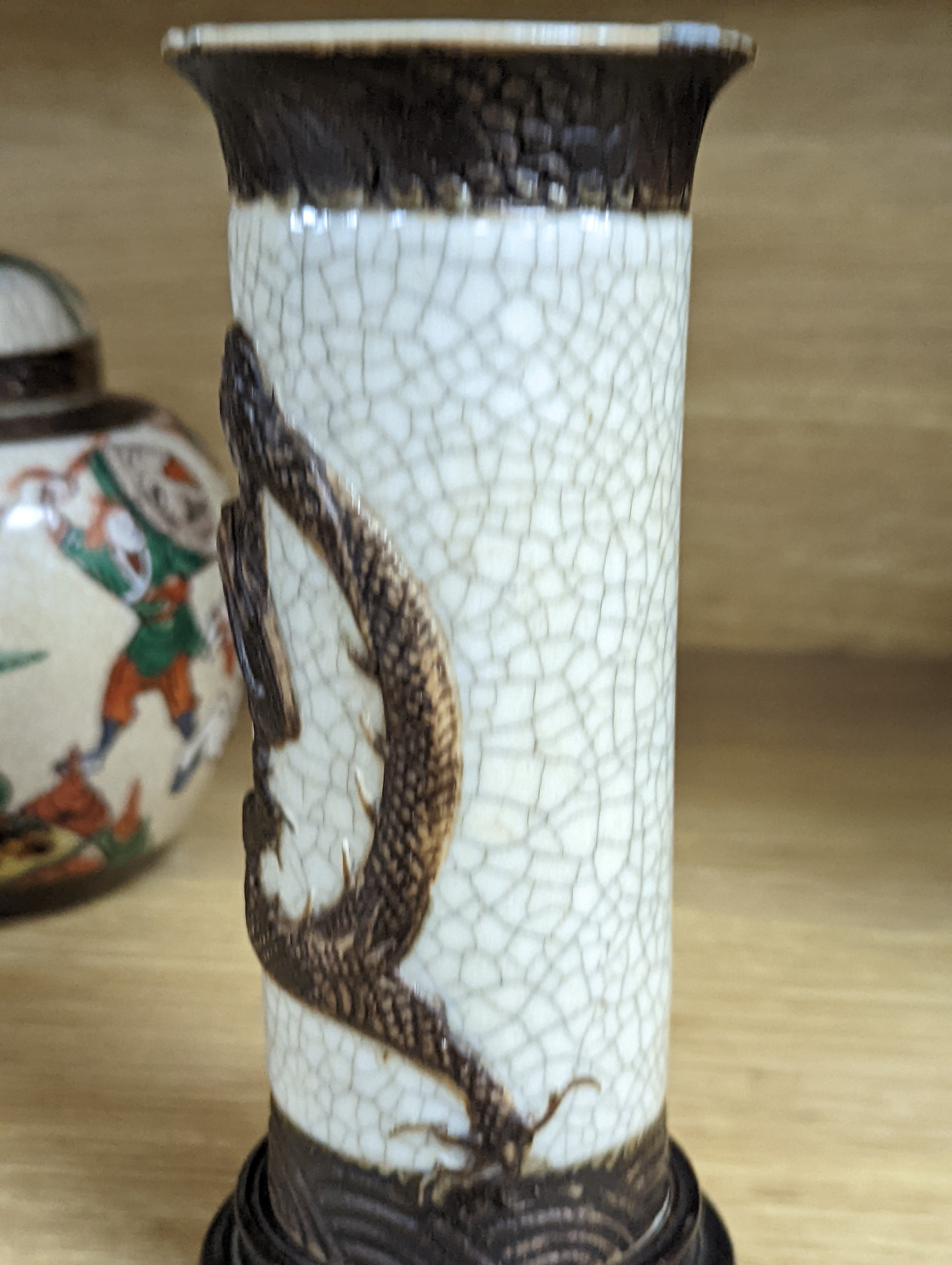 A Chinese famille verte crackle glaze jar and cover, 14.5cm, two famille rose dishes and a crackle glaze ‘dragon’ vase, all late 19th/early 20th century